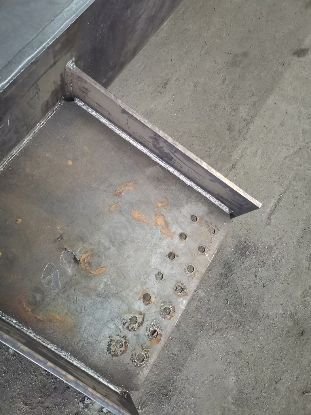 Engineered steel connection plate with precision-drilled bolt holes for maximum load distribution